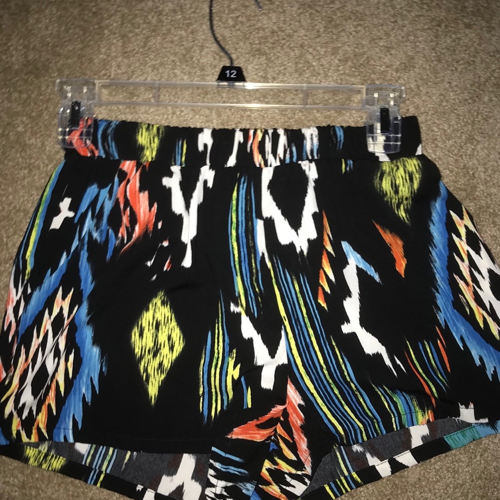2 pairs of flowy patterned shorts